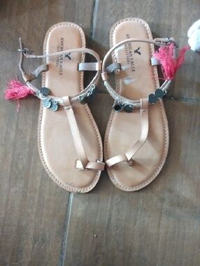 American Eagle Outfitters Tan Leather T-Strap Sandals with Pink Tassels